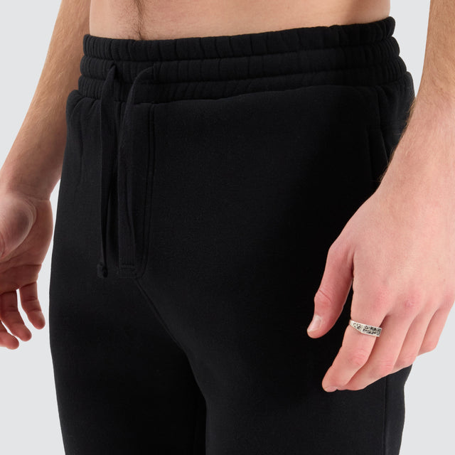 model wears Stanton Heavy Trackpant Jet Black Trackpants Black - image 9