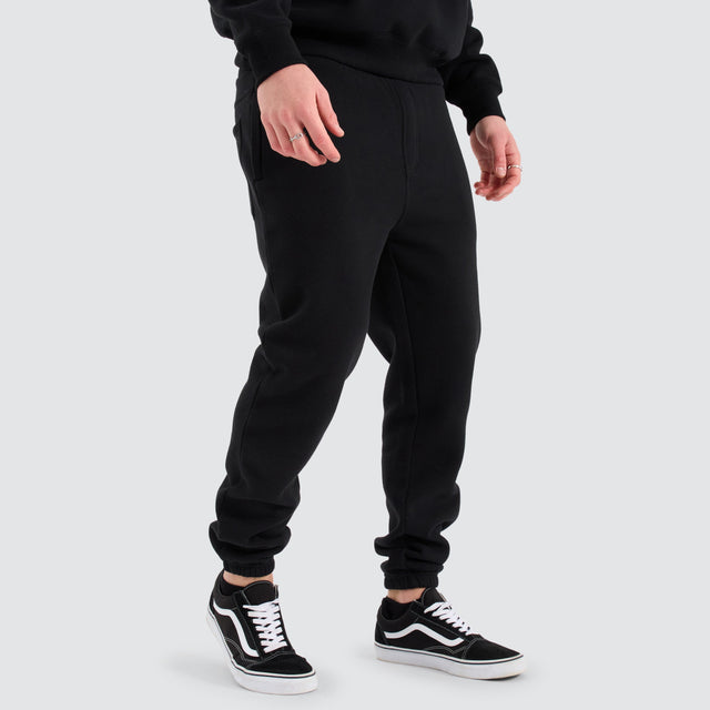 model wears Stanton Heavy Trackpant Jet Black Trackpants Black - image 4
