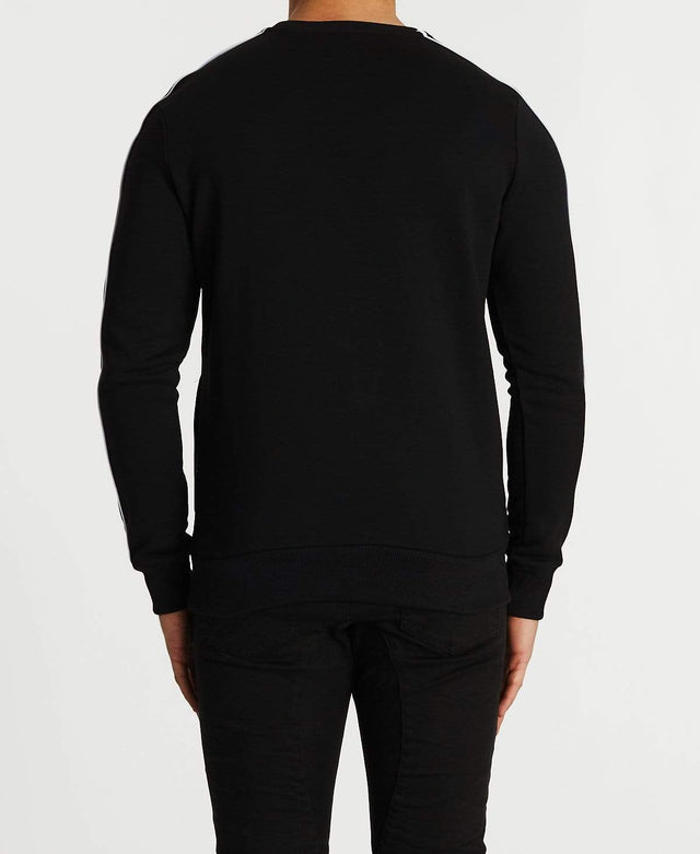 model wears Tennyson Tracksuit Jumper Black/White Fleece Black - image 2