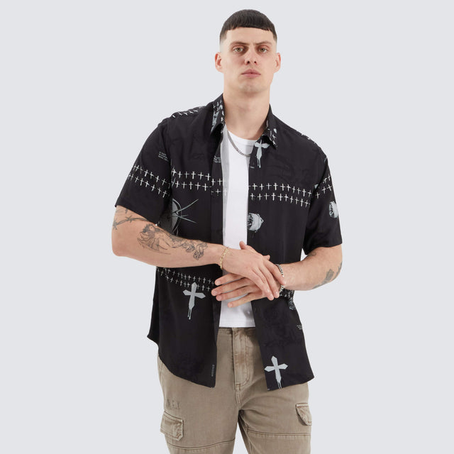 model wears Bwindi Relaxed Shirt Dark Rose Print Short Sleeve Shirts Black - image 2