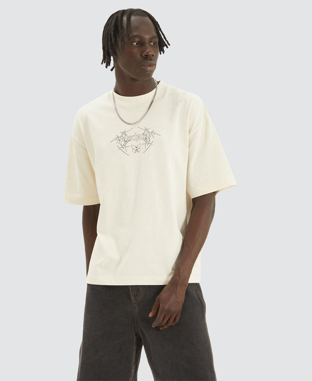 model wears Caught Heavy Crop Tee Neutral Tofu T-Shirts Cream - image 1