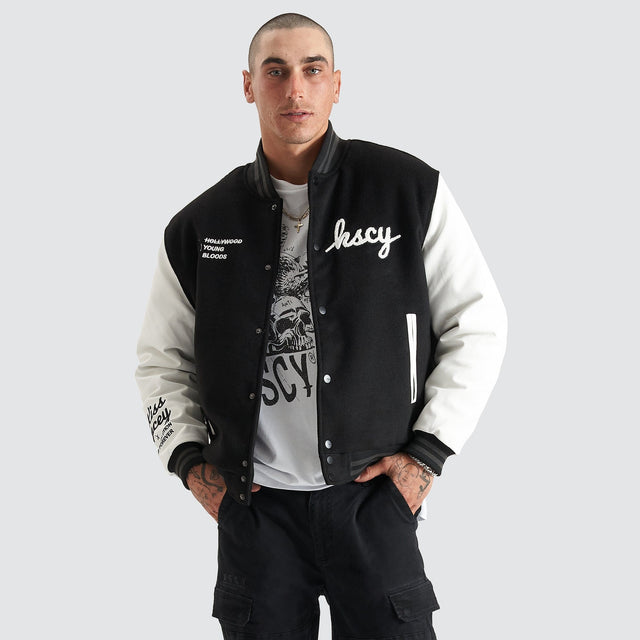 model wears Code Vein Varsity Jacket Jet Black Jackets Black - image 2