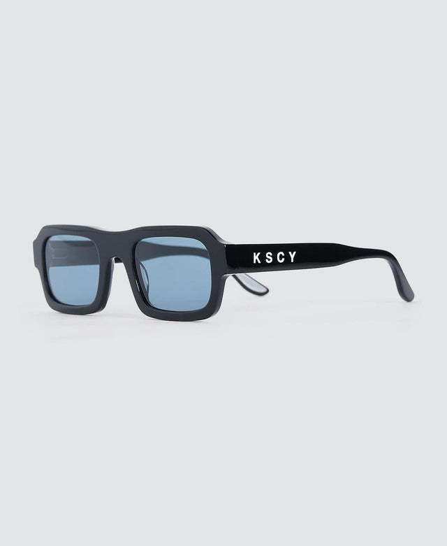 model wears Conman Sunglasses Black/Blue Sunglasses Black - image 3