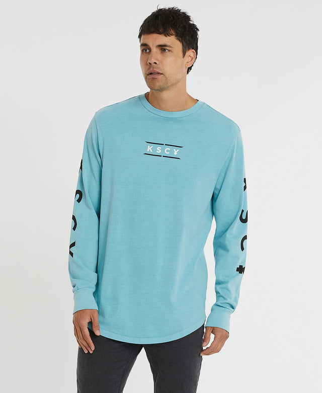 model wears Fractured Long Sleeve Tee Pigment Reef Longsleeve T-Shirts Blue - image 2