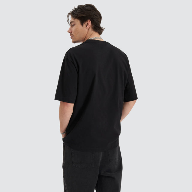 model wears Framed Game Heavy Oversized Tee Jet Black T-Shirts Black - image 3