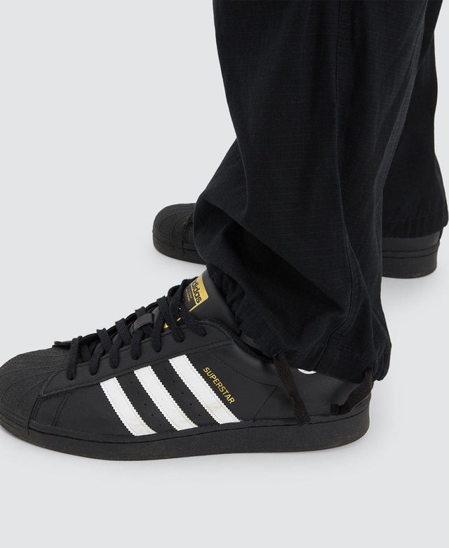 model wears Hunter Ripstop Parachute Pant Washed Black Pants Black - image 9