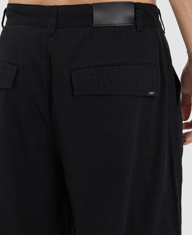 model wears Hunter Ripstop Parachute Pant Washed Black Pants Black - image 10