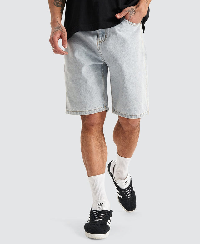 model wears Hyson Baggy Denim Jorts Light Blue Shorts Blue - image 1