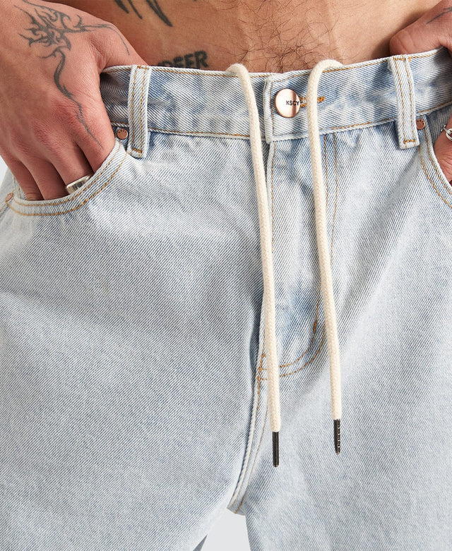 model wears Hyson Baggy Denim Jorts Light Blue Shorts Blue - image 5