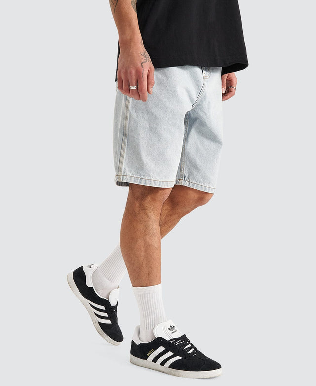 model wears Hyson Baggy Denim Jorts Light Blue Shorts Blue - image 3