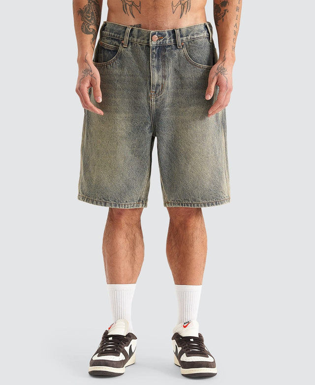 model wears Hyson Baggy Denim Jorts Sandblast Shorts Blue - image 6