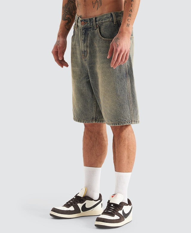 model wears Hyson Baggy Denim Jorts Sandblast Shorts Blue - image 9