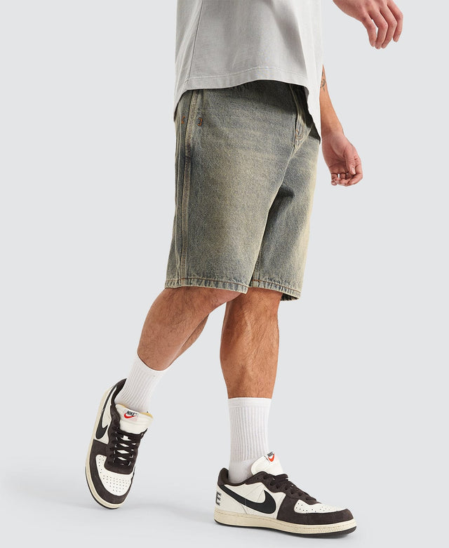 model wears Hyson Baggy Denim Jorts Sandblast Shorts Blue - image 4