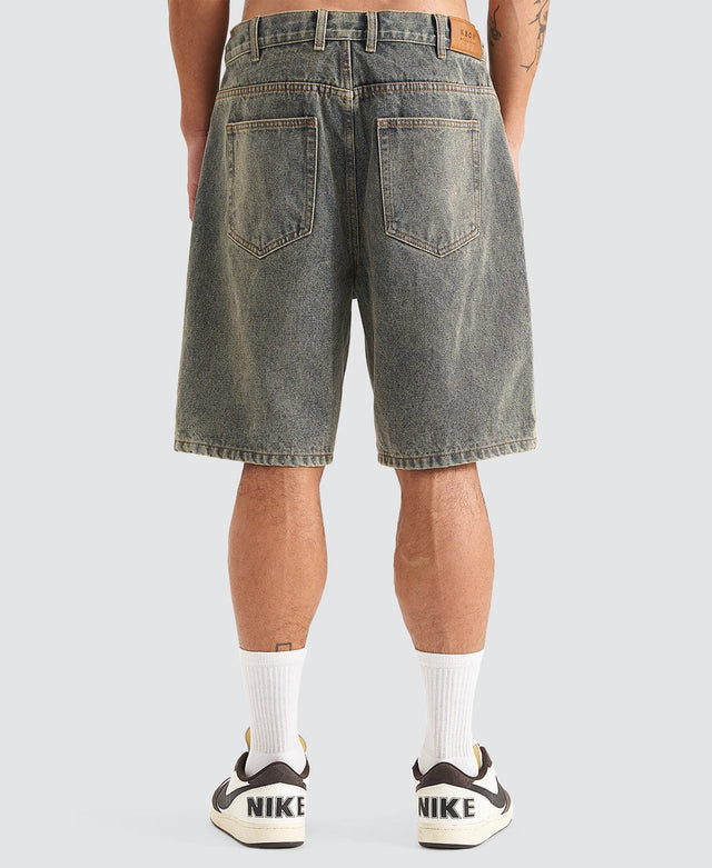 model wears Hyson Baggy Denim Jorts Sandblast Shorts Blue - image 7