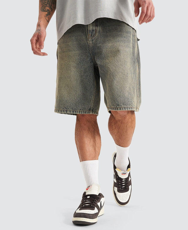 model wears Hyson Baggy Denim Jorts Sandblast Shorts Blue - image 1