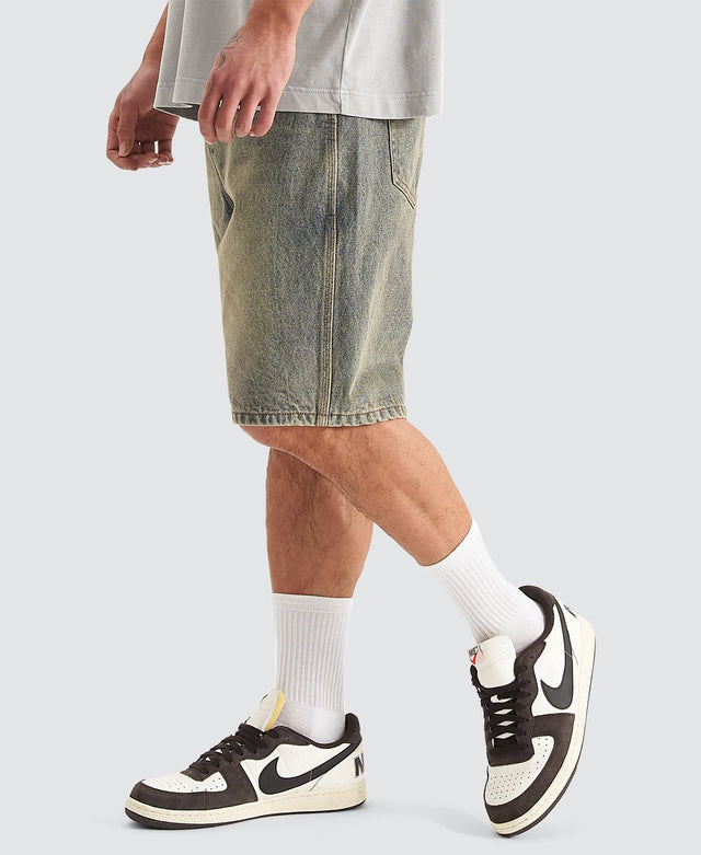 model wears Hyson Baggy Denim Jorts Sandblast Shorts Blue - image 5