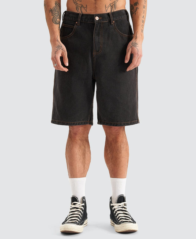 model wears Hyson Baggy Denim Jorts Washed Black Shorts Black - image 2