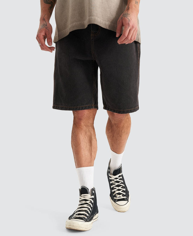 model wears Hyson Baggy Denim Jorts Washed Black Shorts Black - image 1