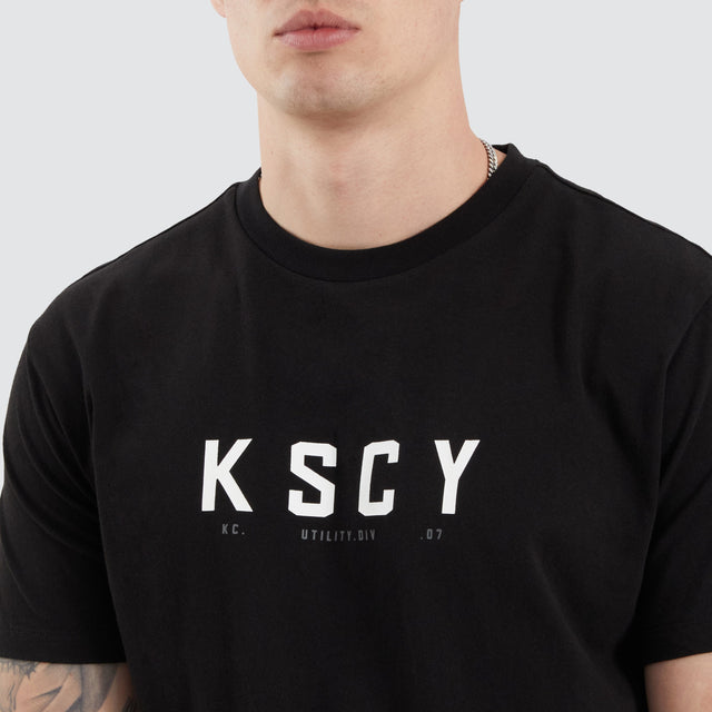 model wears Ilment Dual Curved Tee Jet Black T-Shirts Black - image 2