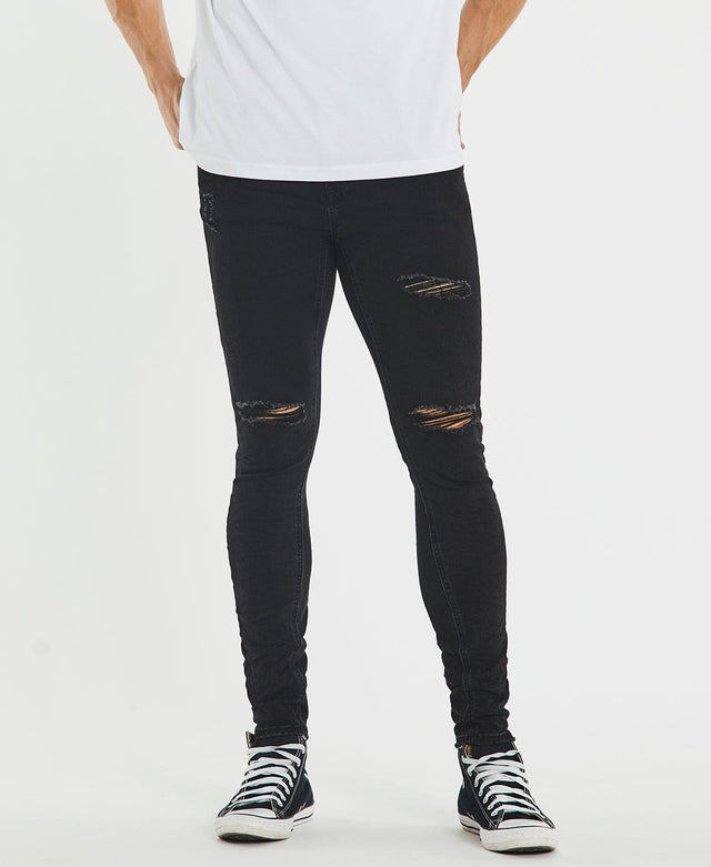 model wears K1 Super Skinny Fit Jean Destroyed Washed Black Pants Black - image 1