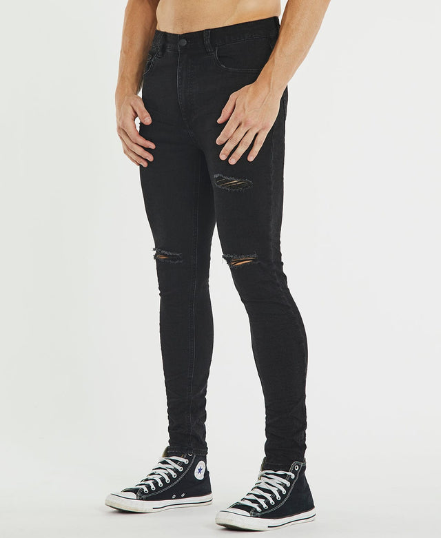 model wears K1 Super Skinny Fit Jean Destroyed Washed Black Pants Black - image 6