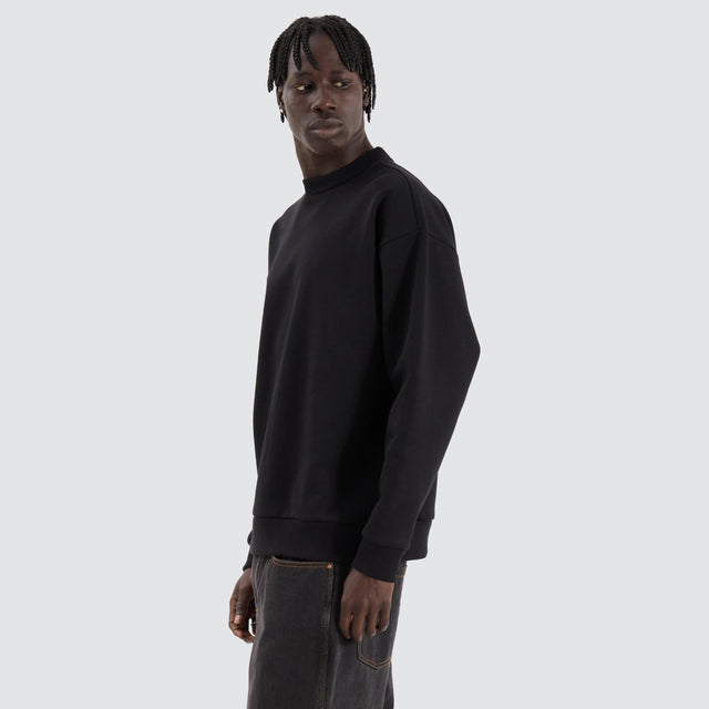 model wears Medora Relaxed Sweater Jet Black Jumpers Black - image 2