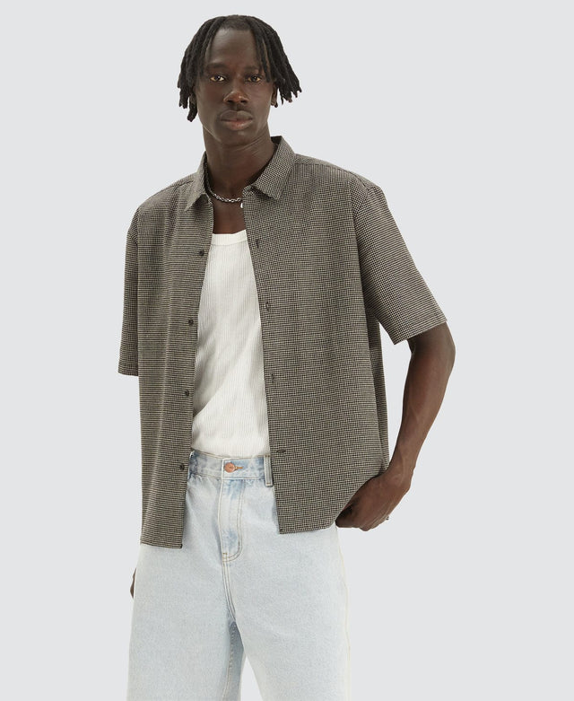 model wears Micro Check Skate Shirt Black/Brown Short Sleeve Shirts Black - image 1