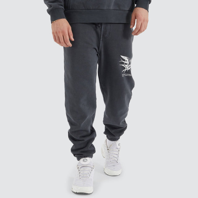 model wears Monzie Heavy Trackpant Pigment Asphalt Trackpants Grey - image 3