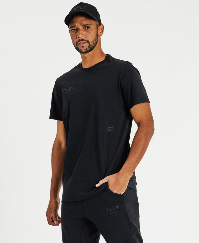 model wears Motion Active T-Shirt Jet Black T-Shirts Black - image 7