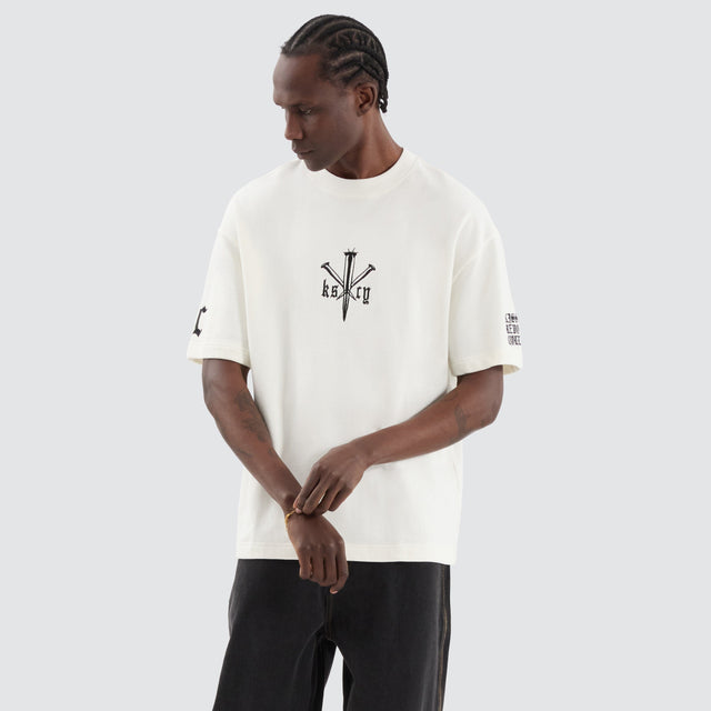 model wears Revolation Loopback Street Tee Natural White T-Shirts White - image 4