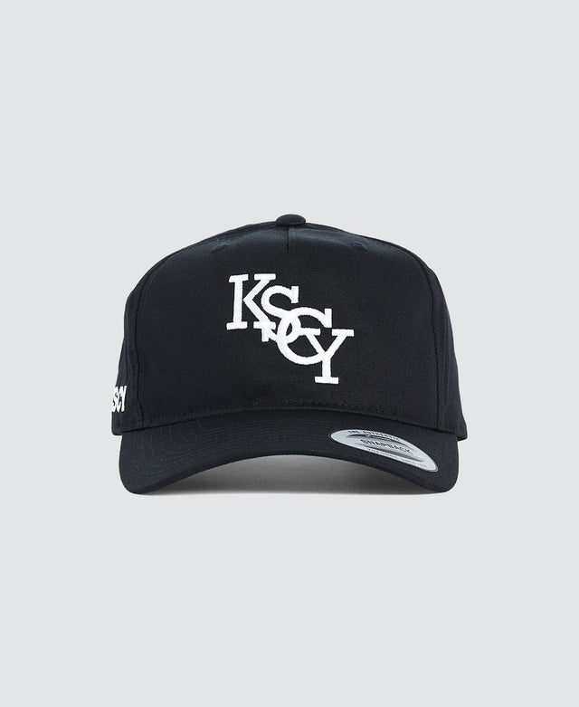 model wears Strother Golfer Cap Jet Black Headwear Black - image 1