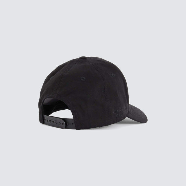 model wears Winsted 5 Panel Curved Peak Cap Black Headwear Black - image 3