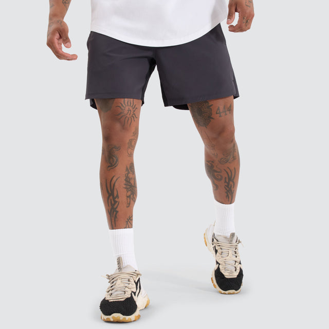 model wears Endurance Sport Short Charcoal Shorts Grey - image 3