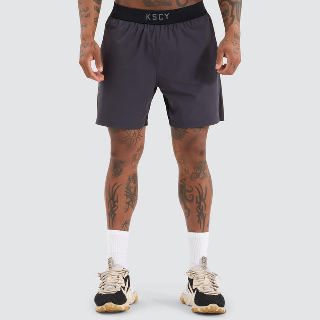 model wears Endurance Sport Short Charcoal Shorts Grey - image 1