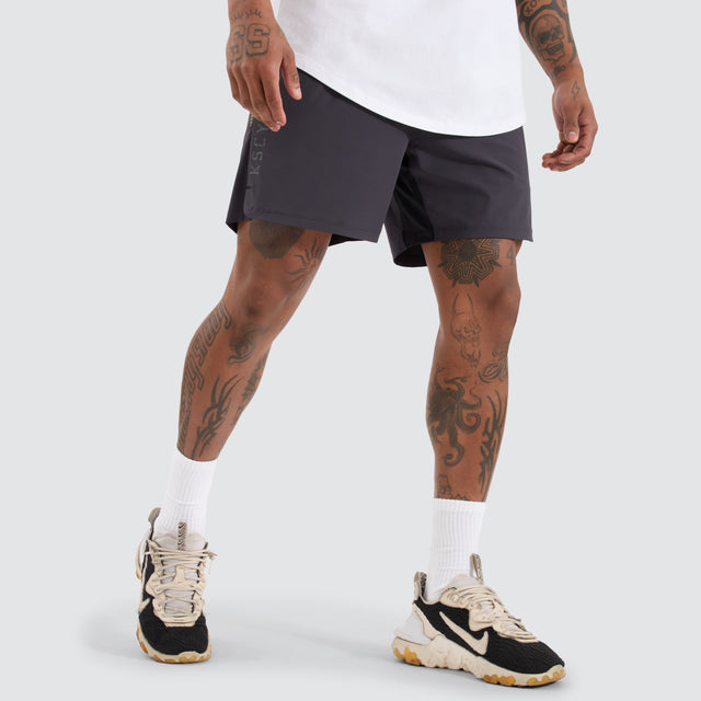 model wears Endurance Sport Short Charcoal Shorts Grey - image 4