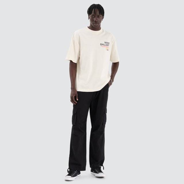 model wears Reality Heavy Street Tee Tofu T-Shirts Cream - image 11