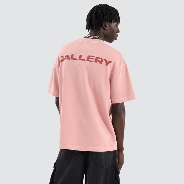 model wears Smashed Loopback Street Tee Acid Rose T-Shirts Pink - image 2