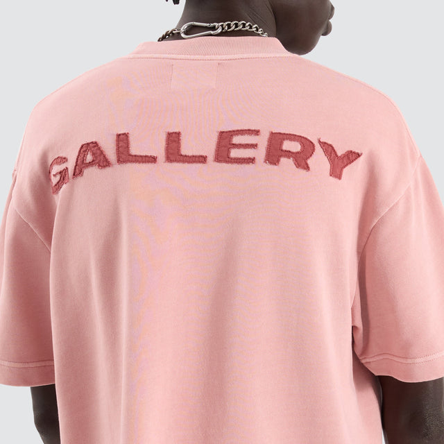 model wears Smashed Loopback Street Tee Acid Rose T-Shirts Pink - image 5