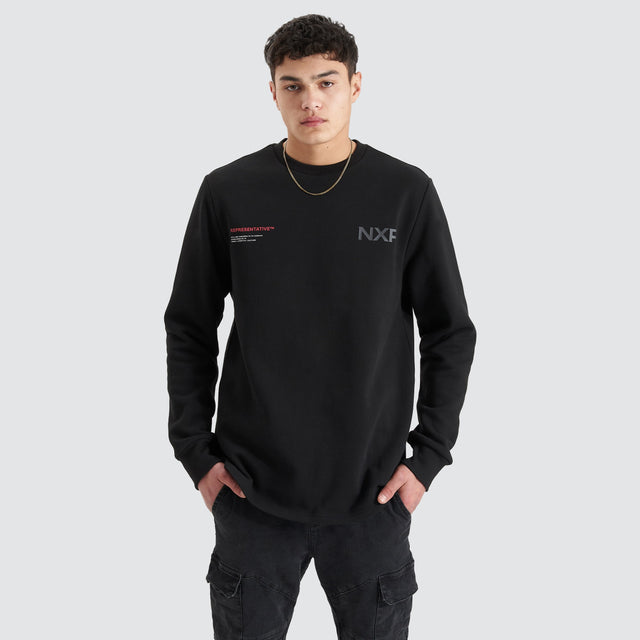 model wears Adjacent Dual Curved Sweater Jet Black Jumpers Black - image 6