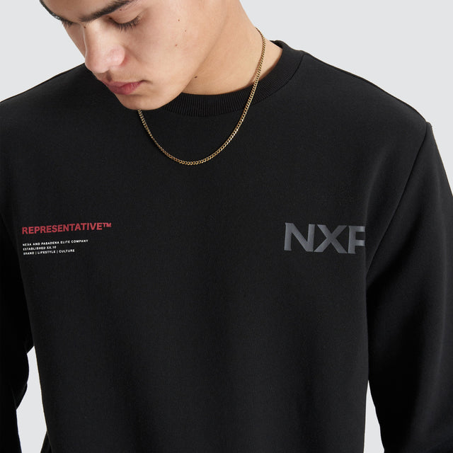 model wears Adjacent Dual Curved Sweater Jet Black Jumpers Black - image 3