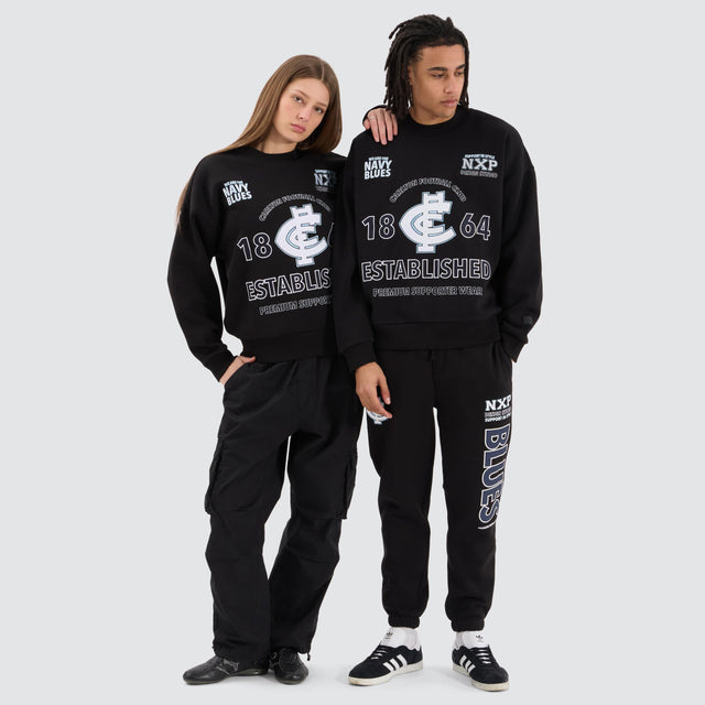 model wears Carlton Blues AFL Box Fit Sweater Jet Black Jumpers Black - image 2