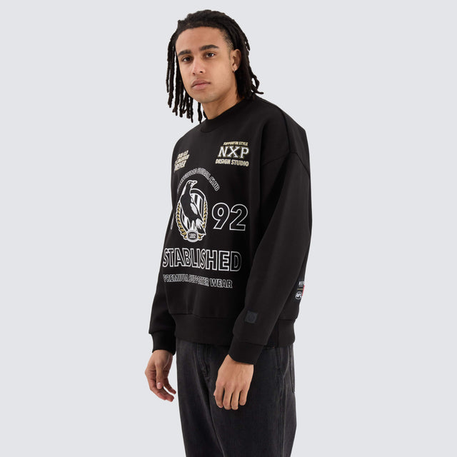 model wears Collingwood Magpies AFL Box Fit Sweater Jet Black Jumpers Black - image 5