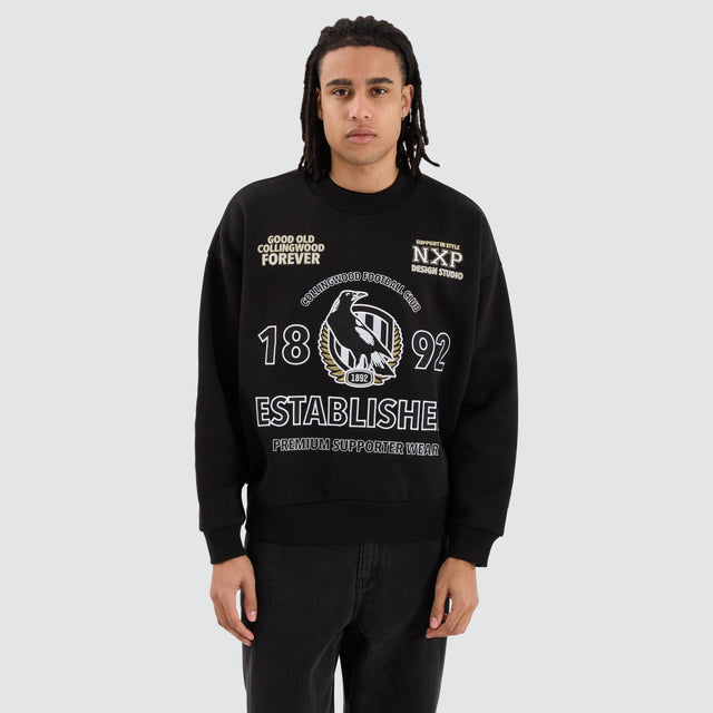 model wears Collingwood Magpies AFL Box Fit Sweater Jet Black Jumpers Black - image 1
