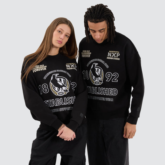 model wears Collingwood Magpies AFL Box Fit Sweater Jet Black Jumpers Black - image 4
