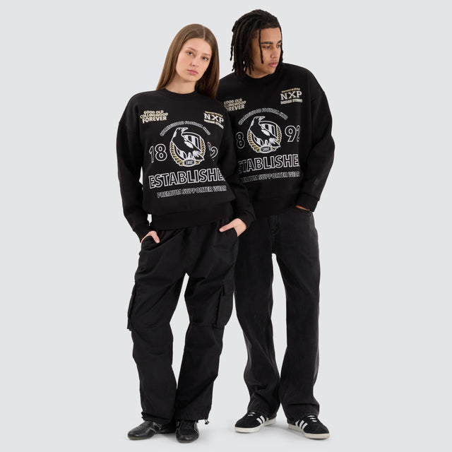model wears Collingwood Magpies AFL Box Fit Sweater Jet Black Jumpers Black - image 7