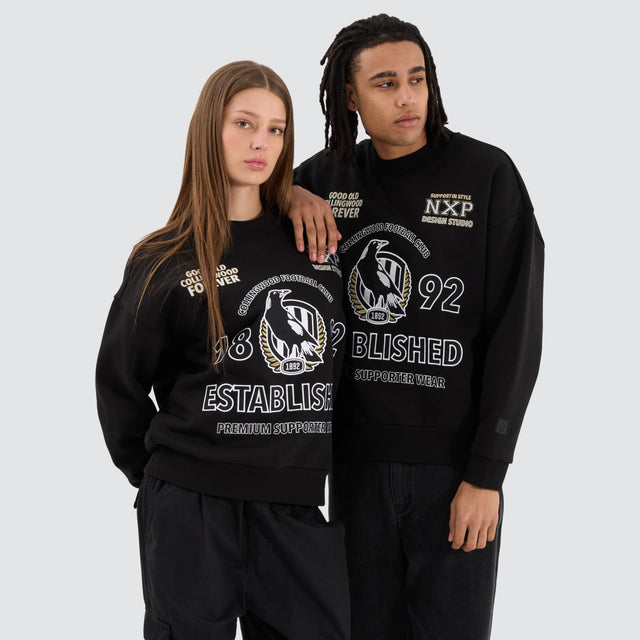 model wears Collingwood Magpies AFL Box Fit Sweater Jet Black Jumpers Black - image 2