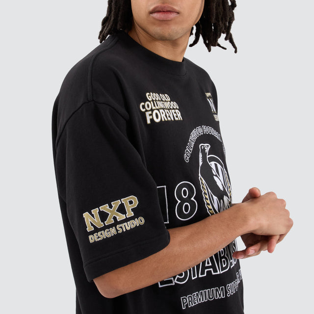 model wears Collingwood Magpies AFL Mega Loopback Tee Jet Black T-Shirts Black - image 2
