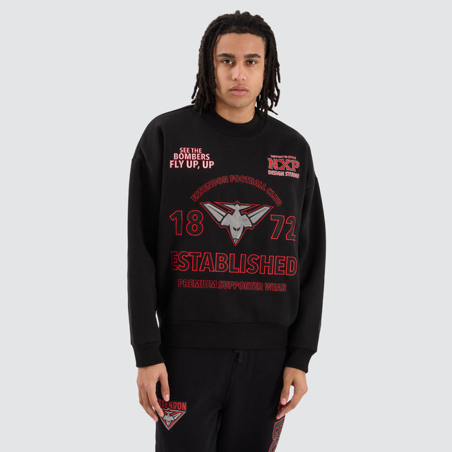 model wears Essendon Bombers AFL Box Fit Sweater Jet Black Jumpers Black - image 1