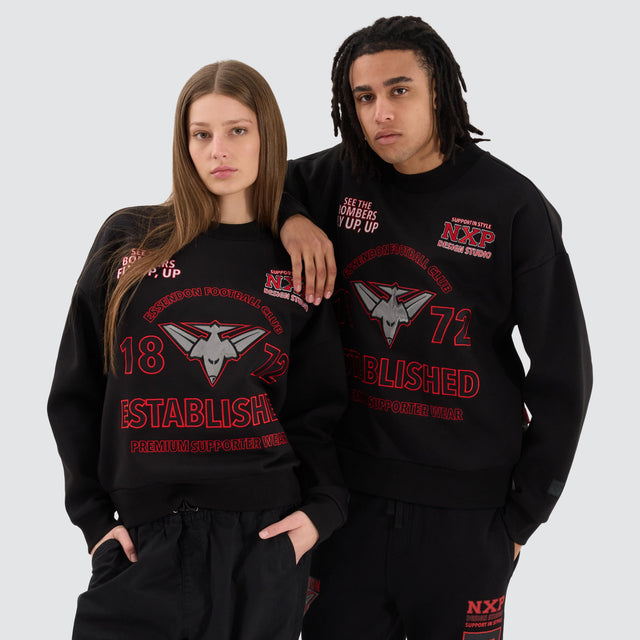 model wears Essendon Bombers AFL Box Fit Sweater Jet Black Jumpers Black - image 2