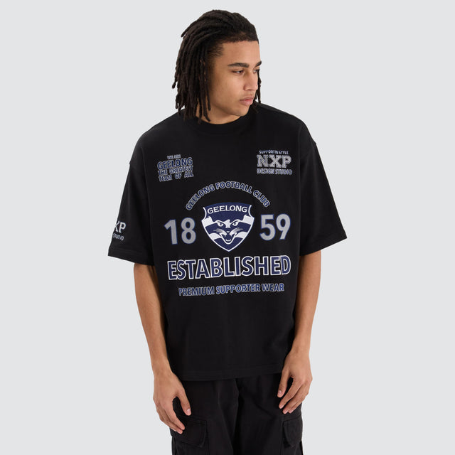 model wears Geelong Cats AFL Mega Loopback Tee Jet Black T-Shirts Black - image 1